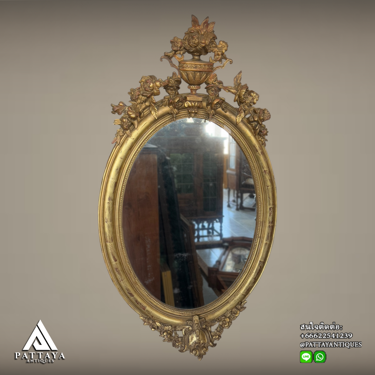 Antique French ornate oval gilded mirror