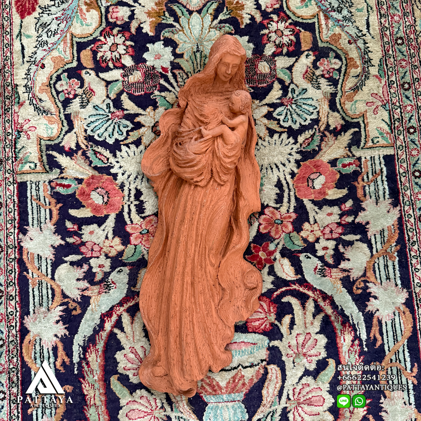 Terracotta Mary holding infant Jesus