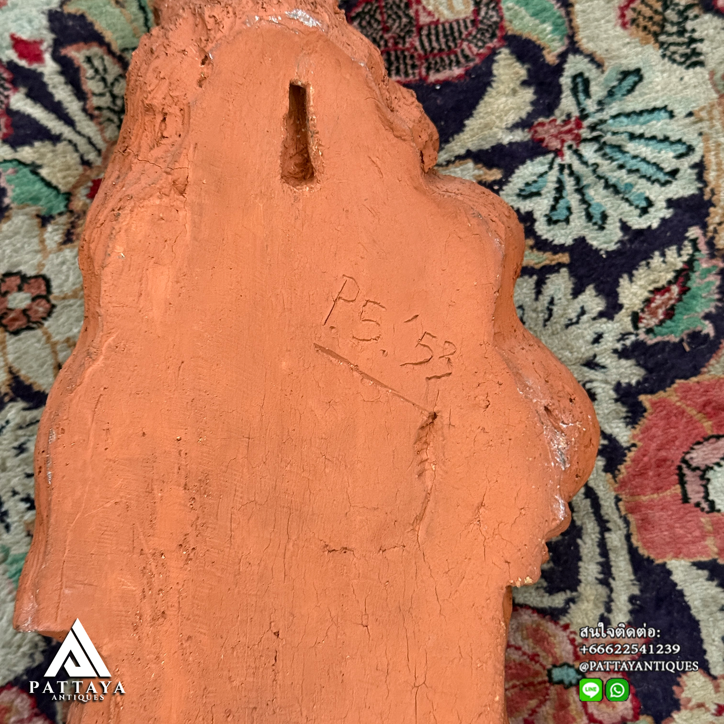 Terracotta Mary holding infant Jesus